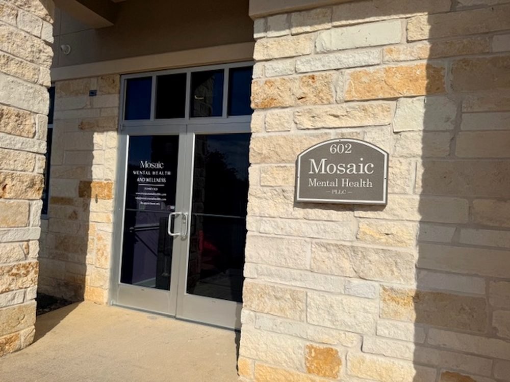 The glass entrance to Suite 602